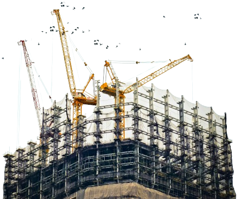 Construction cranes atop a high-rise building