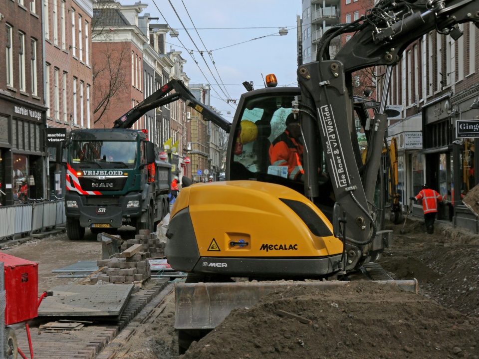 Urban street construction with machinery