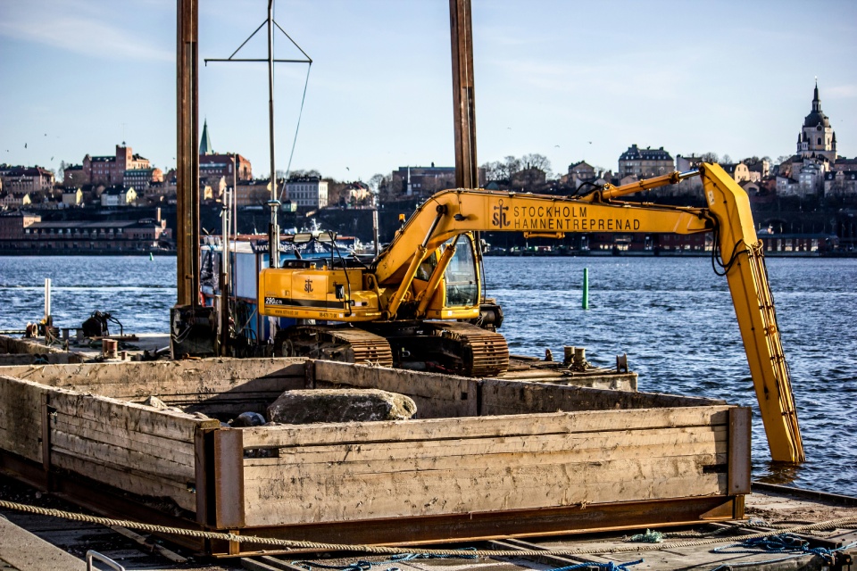 Excavator working on waterfront construction