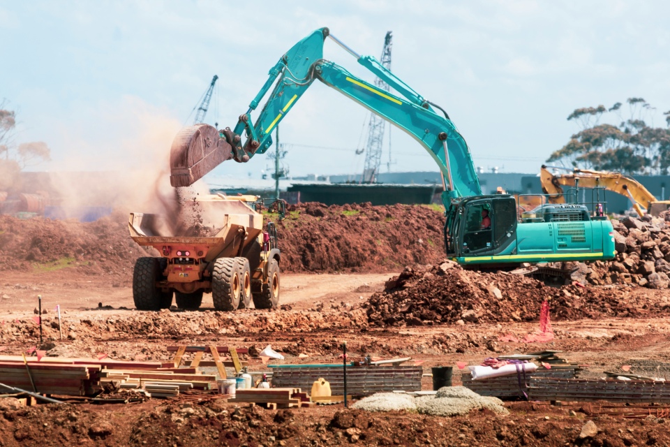 Heavy machinery at a large excavation site